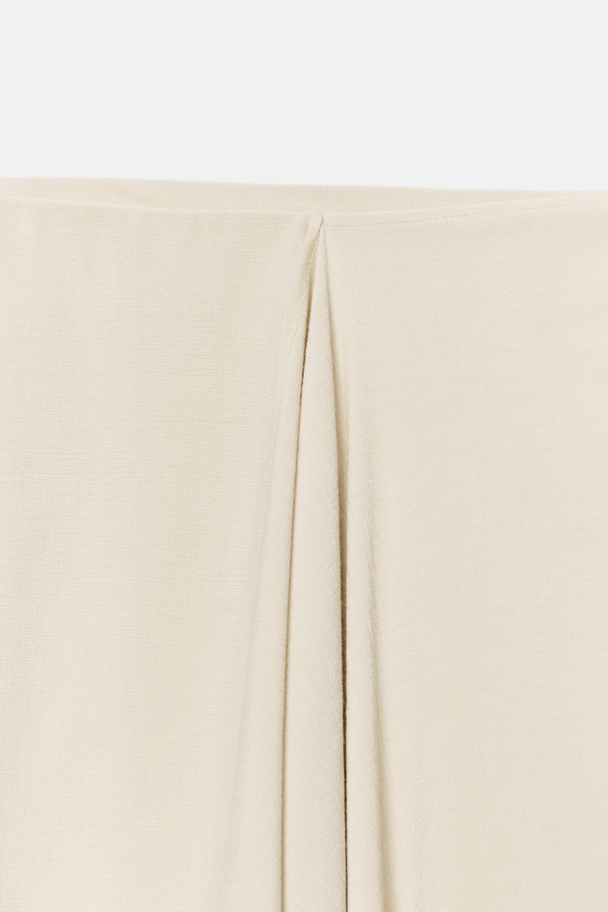 FLOWY ASYMMETRIC SKIRT